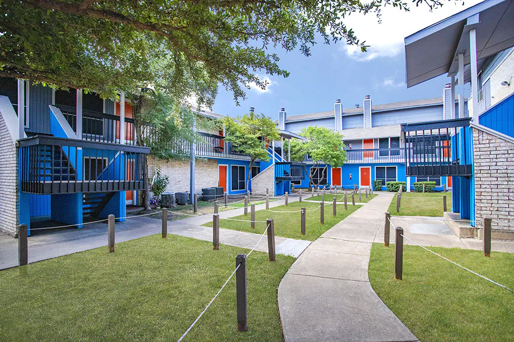 Landscaped courtyard and walkways at Villa Encanto